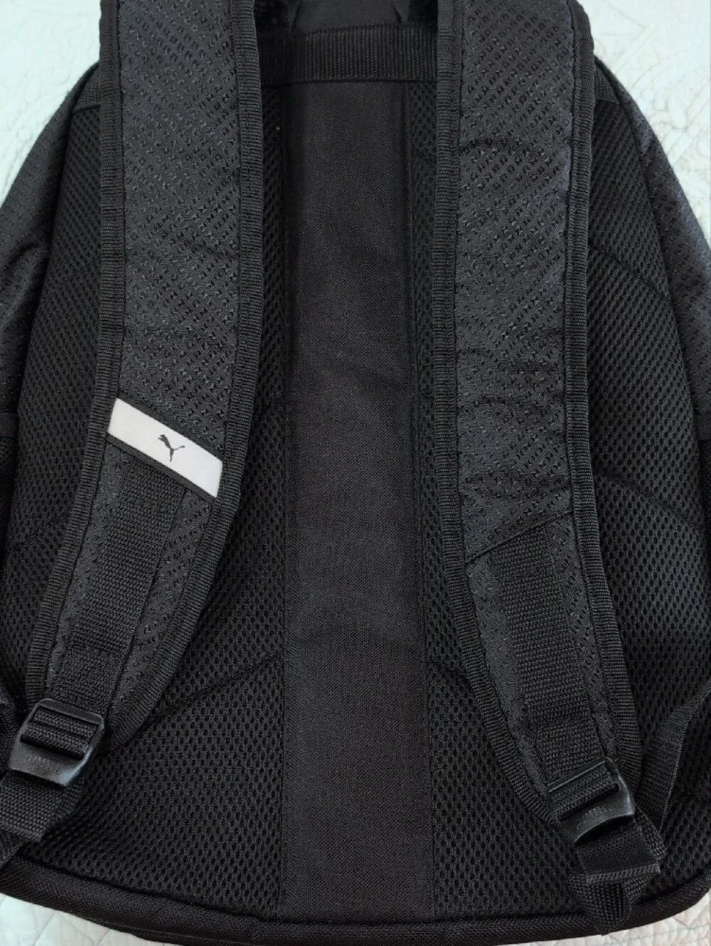 Puma Black Backpack with Coral Logo Accent